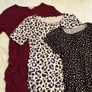 Three knee length, body con style maternity dresses